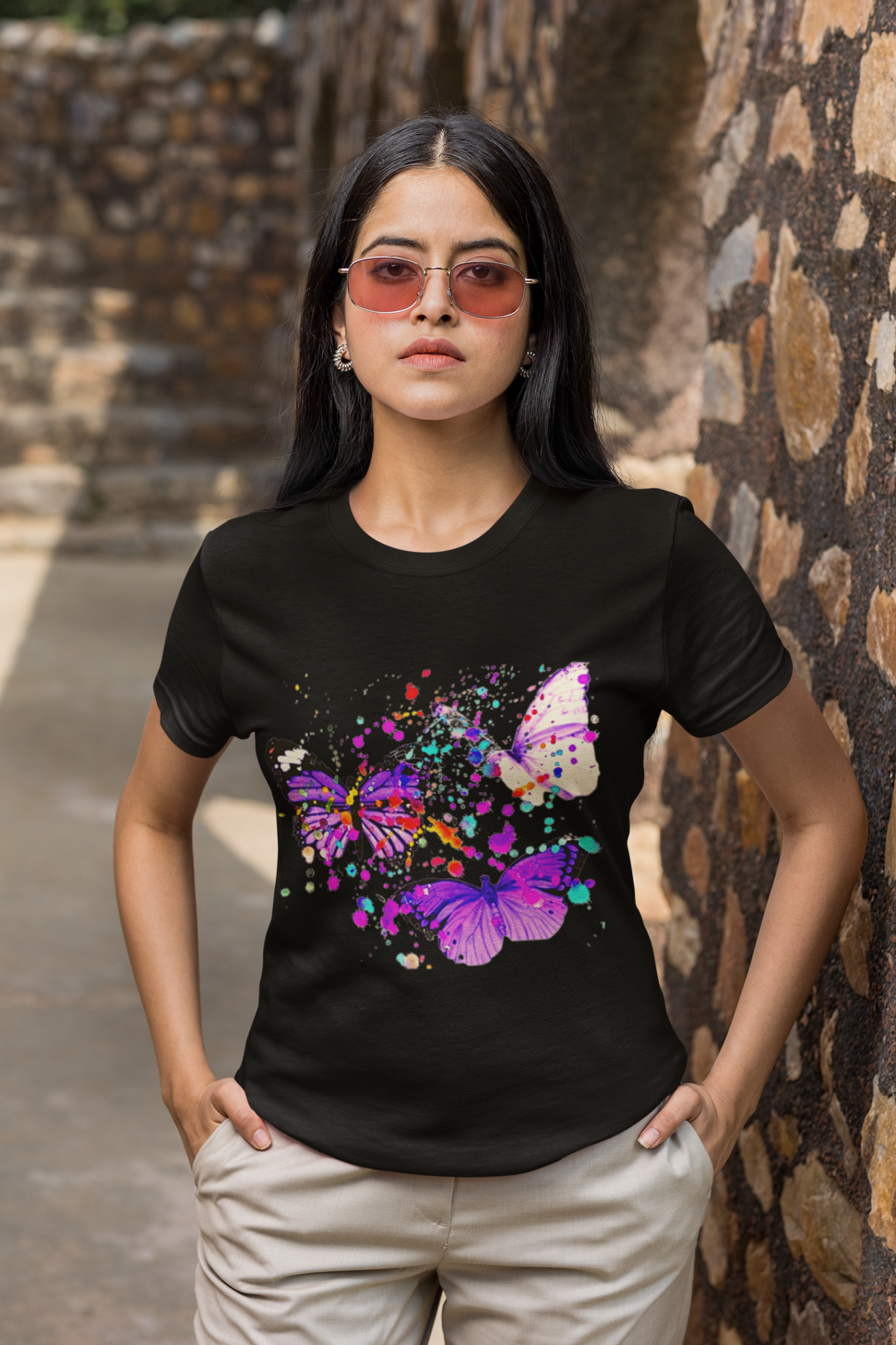 basic-t-shirt-mockup-featuring-a-serious-woman-with-sunglasses-with-her-hands-in-her-pockets-m26378