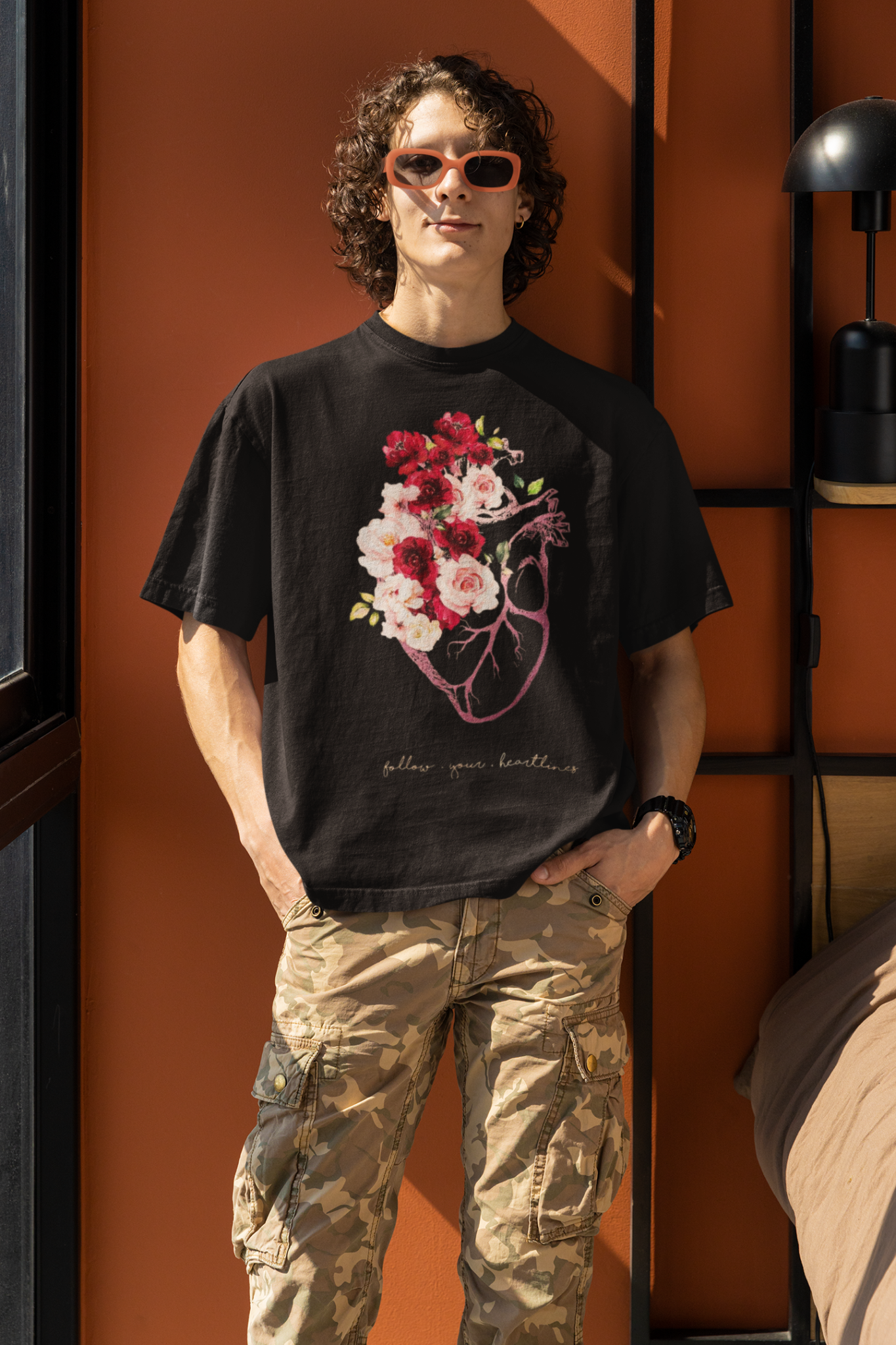 round-neck-t-shirt-mockup-featuring-a-smiling-man-posing-in-his-bedroom-m32076 (1)